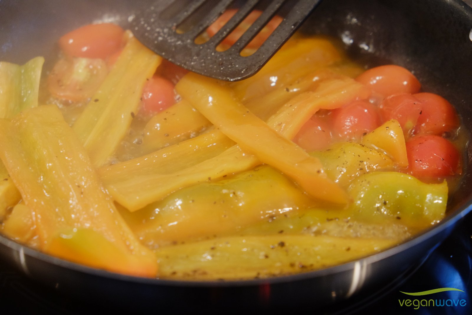 Paprika und Tomaten schmoren